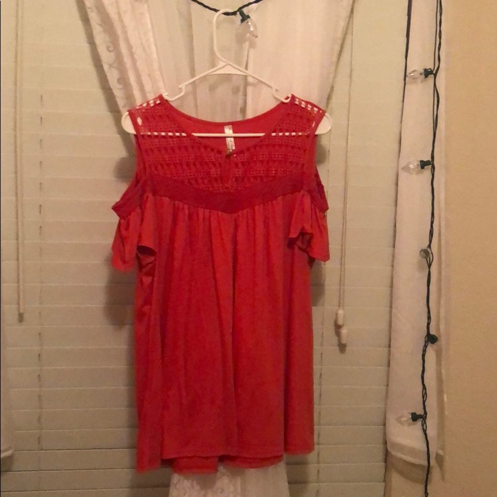 A formal coral orange shirt.
